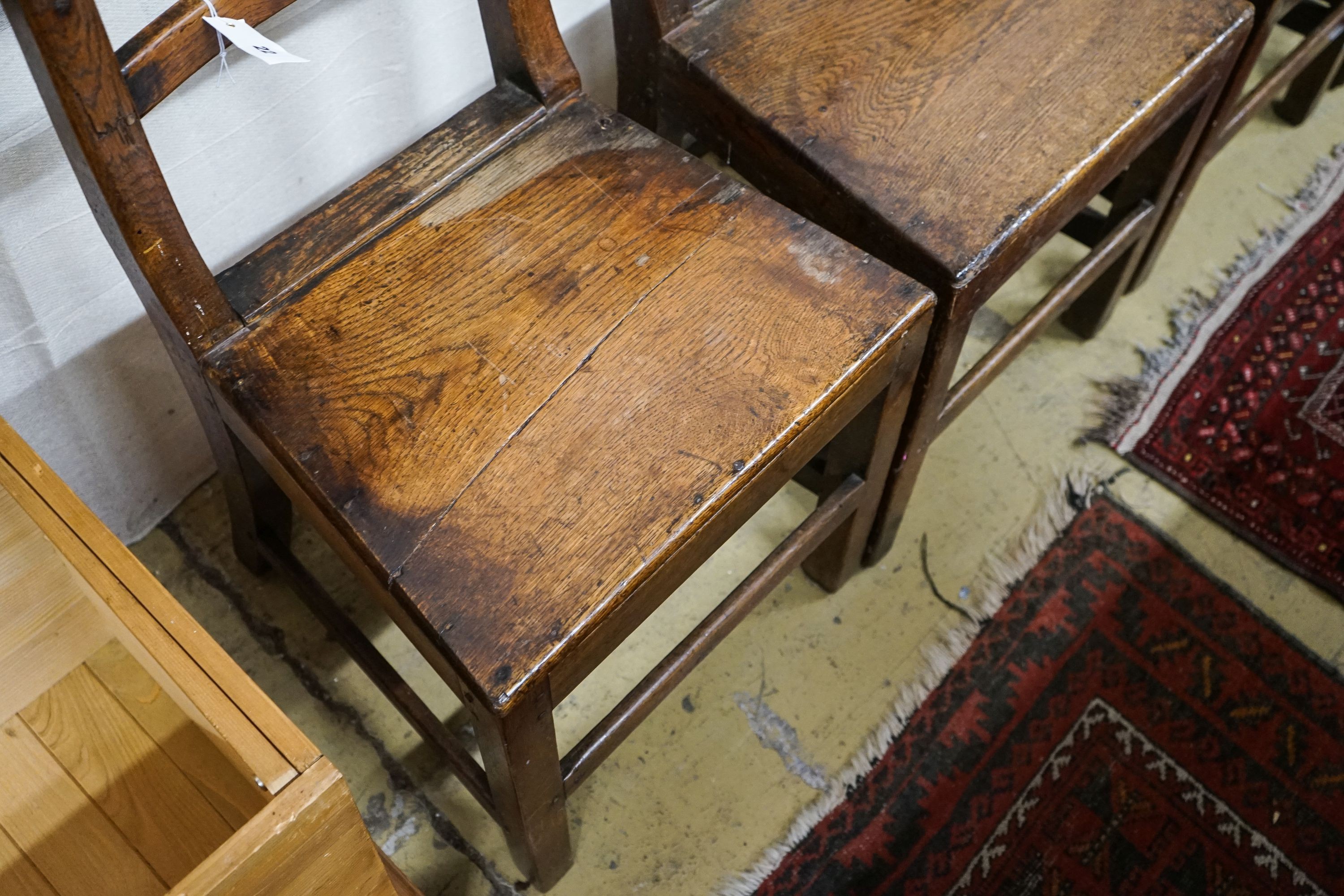 A set of five early 19th century Welsh provincial oak dining chairs